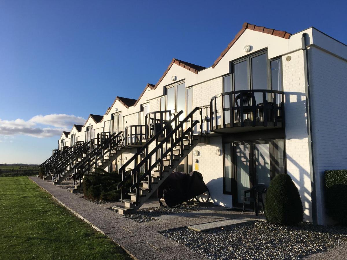Knus Appartement Met Zicht Op Zeepolder De Haan Luaran gambar